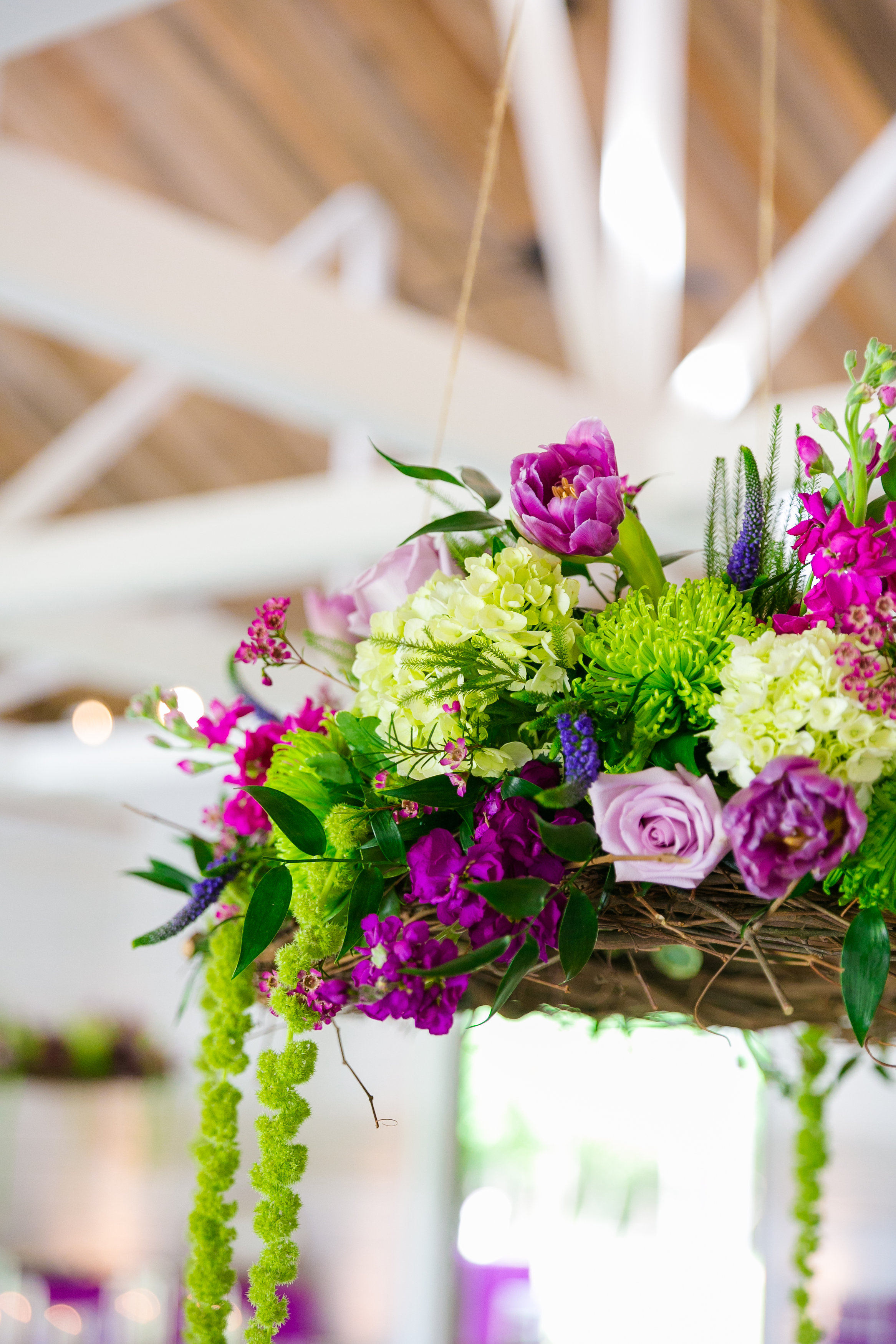 sweetgrass-social-hanging-floral-chandelier-fuchsia-and-green-wedding-flowers-barn-wedding-wildberry-farm