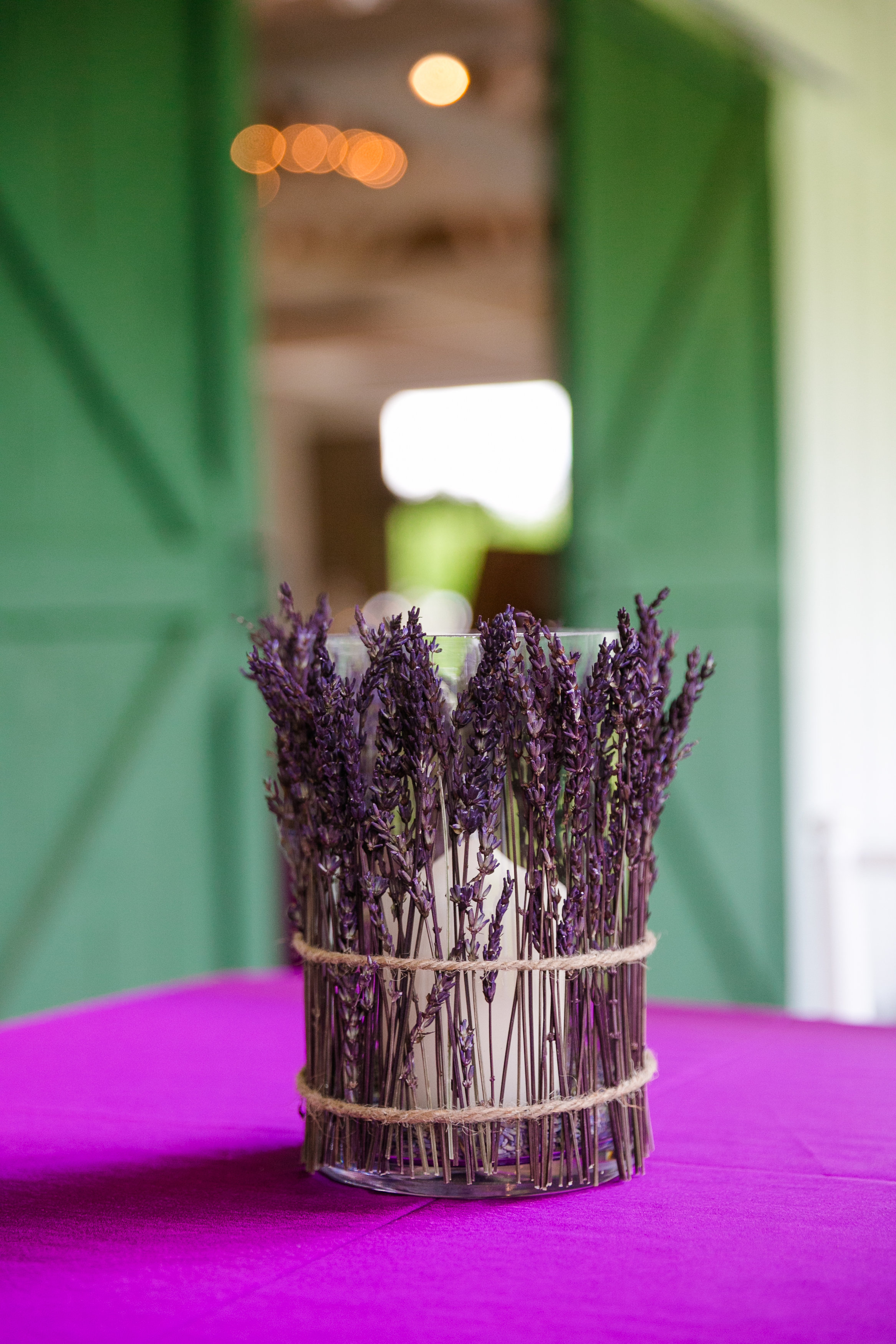 lavender-candle-centerpieces-wedding-reception-barn-decor-rustic-chic-sweetgrass-social-wildberry-farm-dana-cubbage