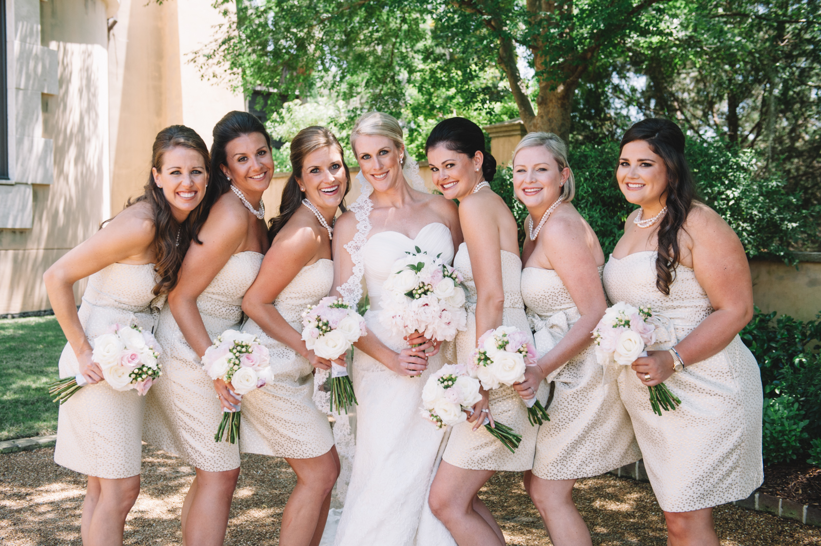 gold-bridesmaids-dresses-with-blush-bouquets