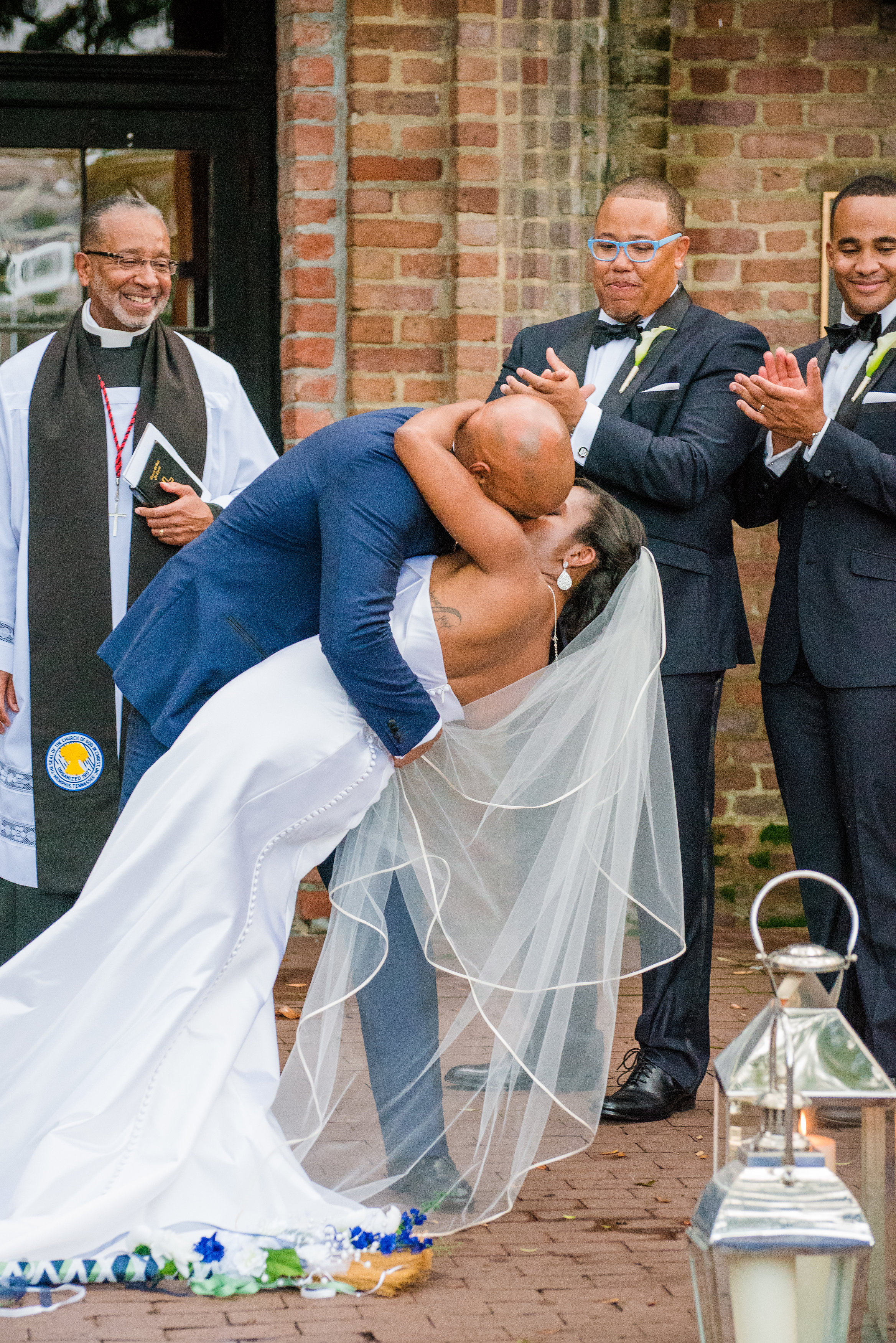 first-kiss-dip-bride-and-groom-wedding-ceremony