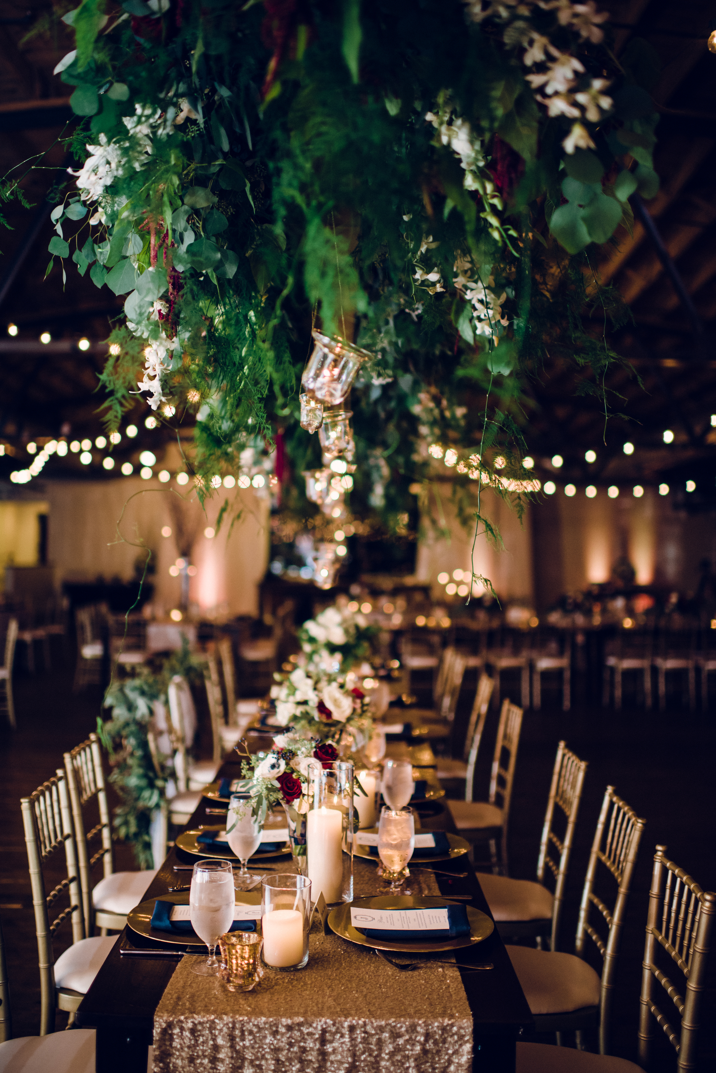 hanging-floral-chandelier-head-table-wedding-reception