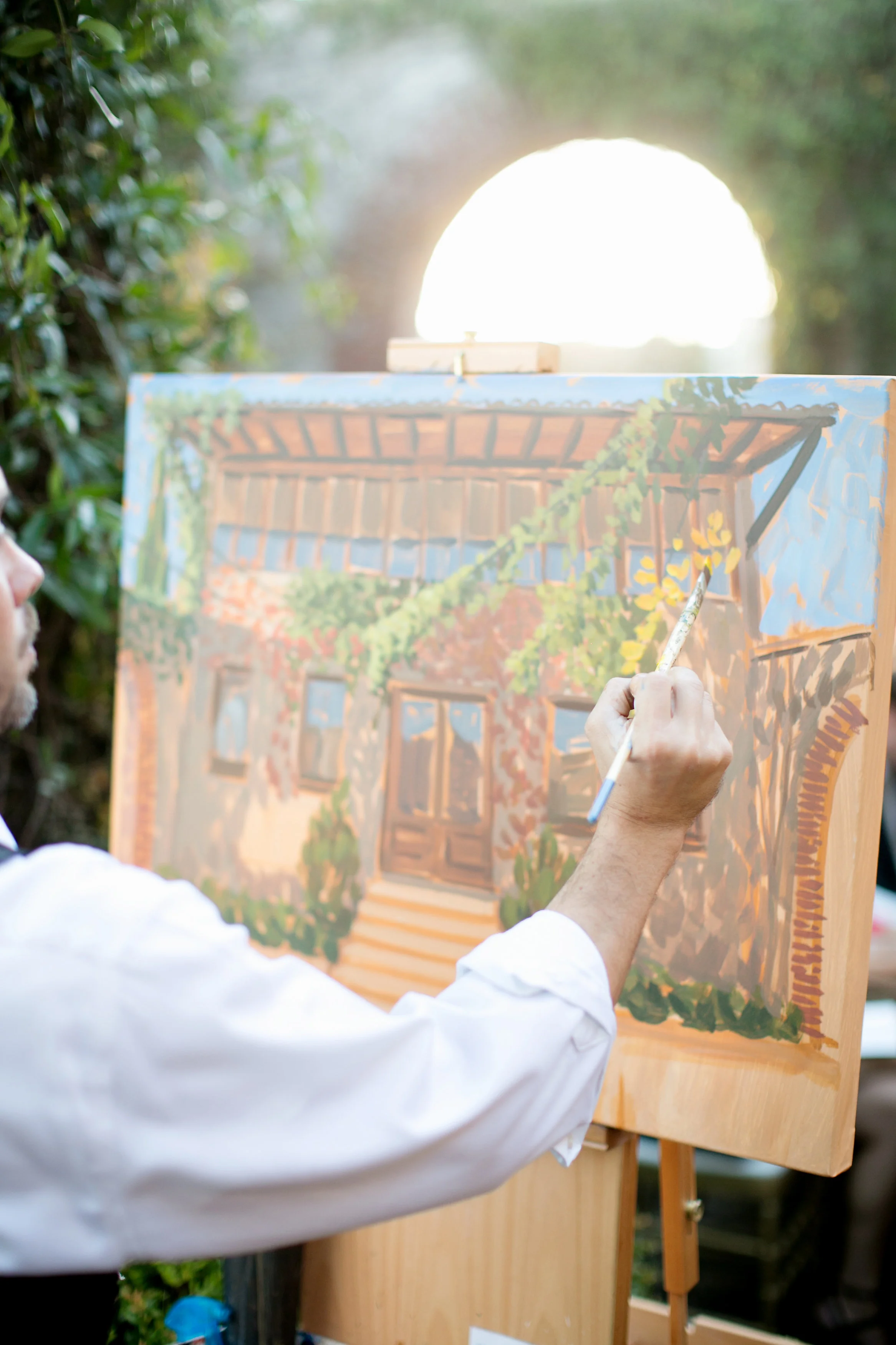 Live wedding painter, Ben Keys, capturing ceremony at Atlanta's Summerour Studio.