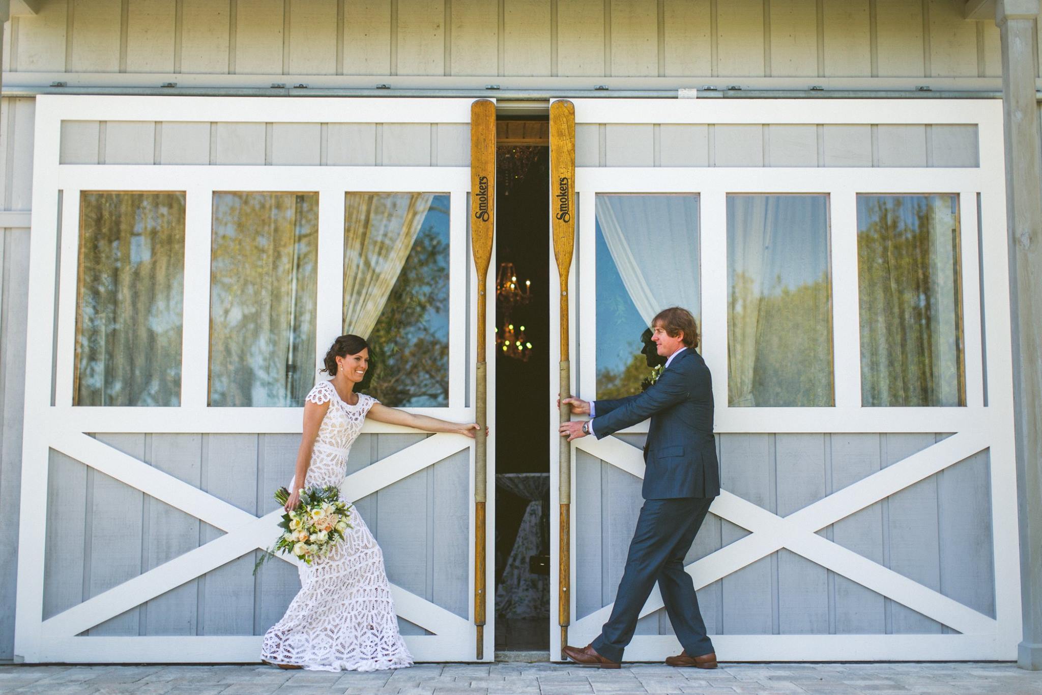 bride-and-groom-welcoming-guests-into-reception