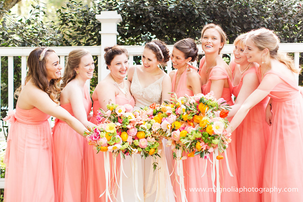 charleston-coral-bridesmaids-dresses-with-colorful-bouquets