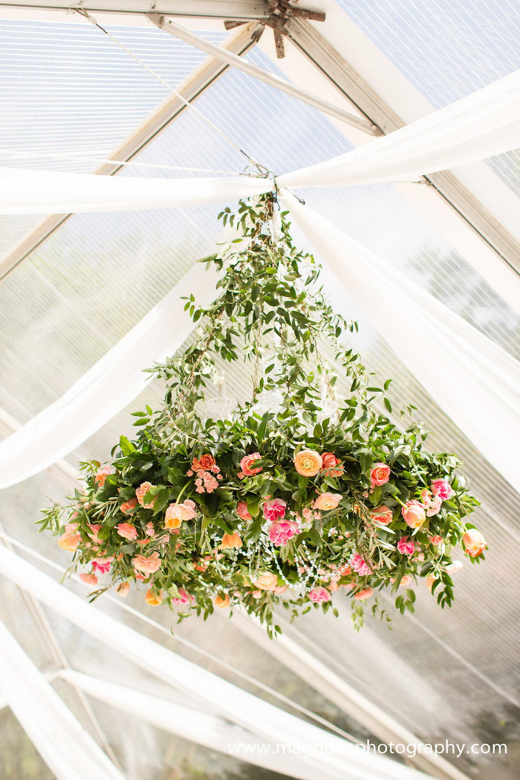 hanging-floral-chandelier-in-clear-tent