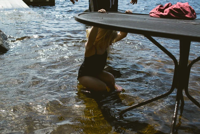 Saturday 2 30pm. We arrive on Tupper Lake. The dock is flooded from heavy rains. We put our feet in the water.