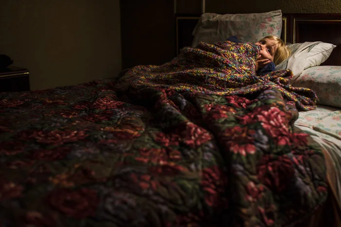 Friday night, 1:30 am. We arrive at a cheap motel to lay our heads down for the next 6 hours. Lucinda believes that we have reached our destination and is overcome with joy.