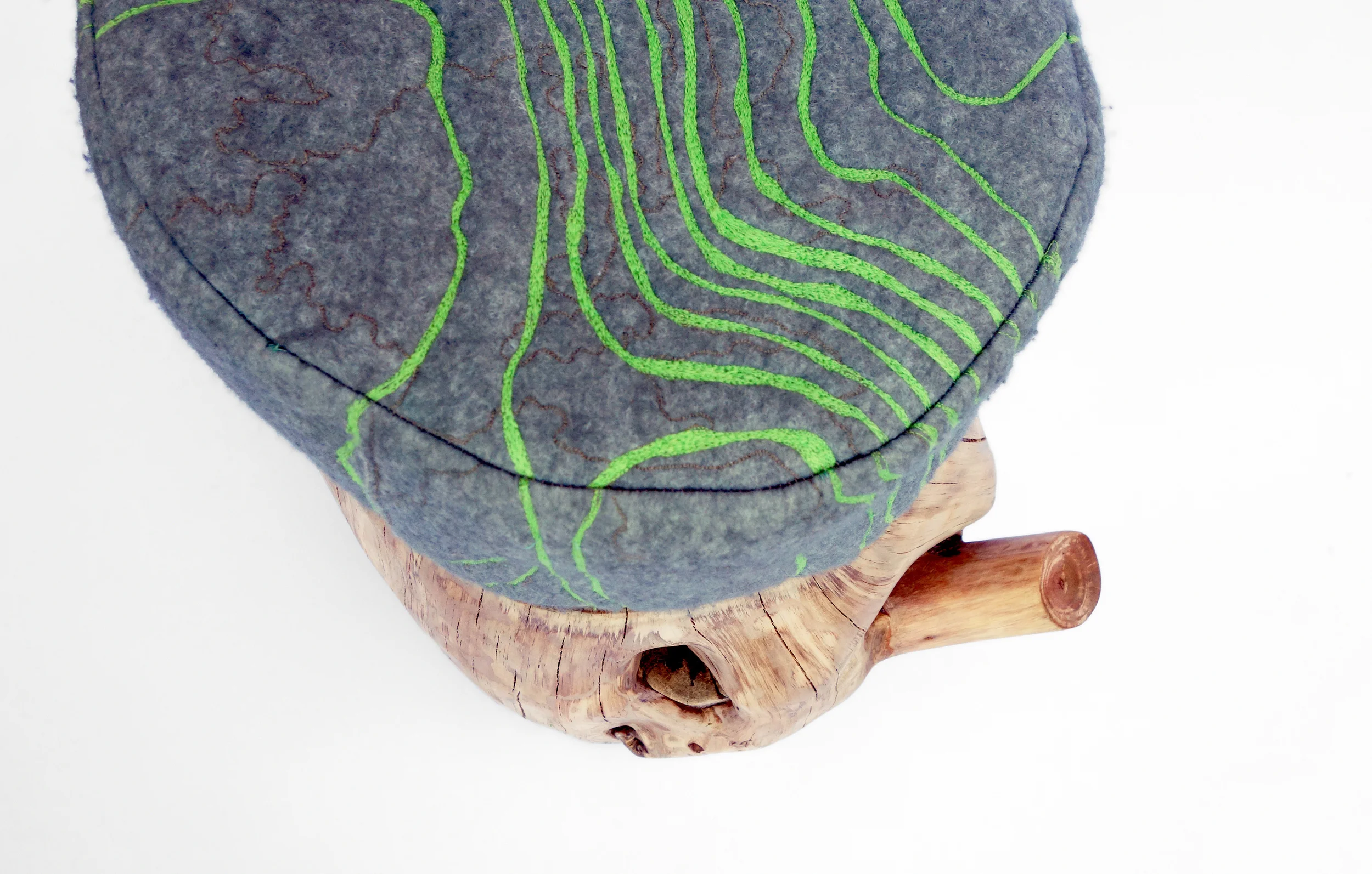 tree stump, felt, thread, industrialized foam Photographed by: Nicholas Baker