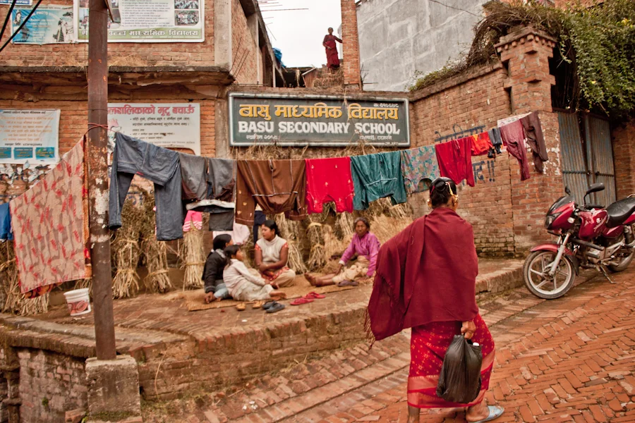 women sitting outside a secondary school in Bhaktapur Nepal.jpg