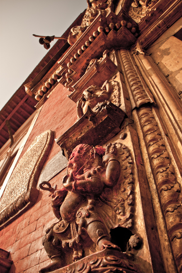 Statues outside a temple door.jpg