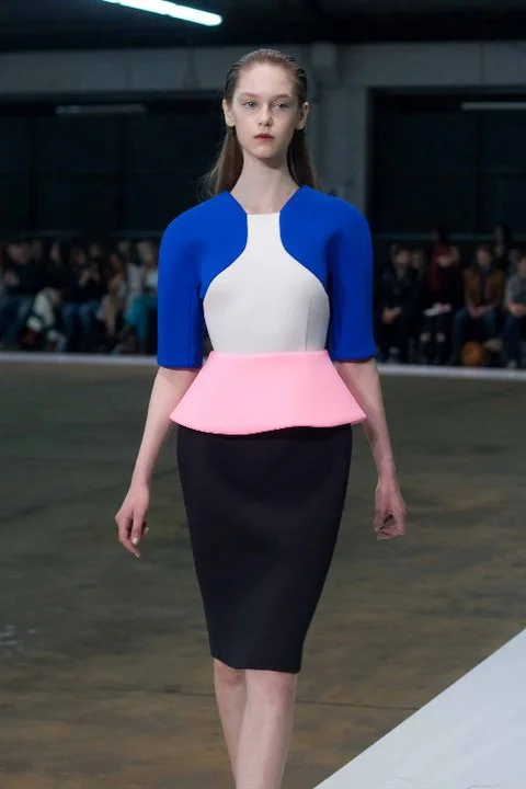 Jemma Baines walks in the Josh Goot S/S 2011 show, which featured lengthy hemlines and signature clean silhouettes.