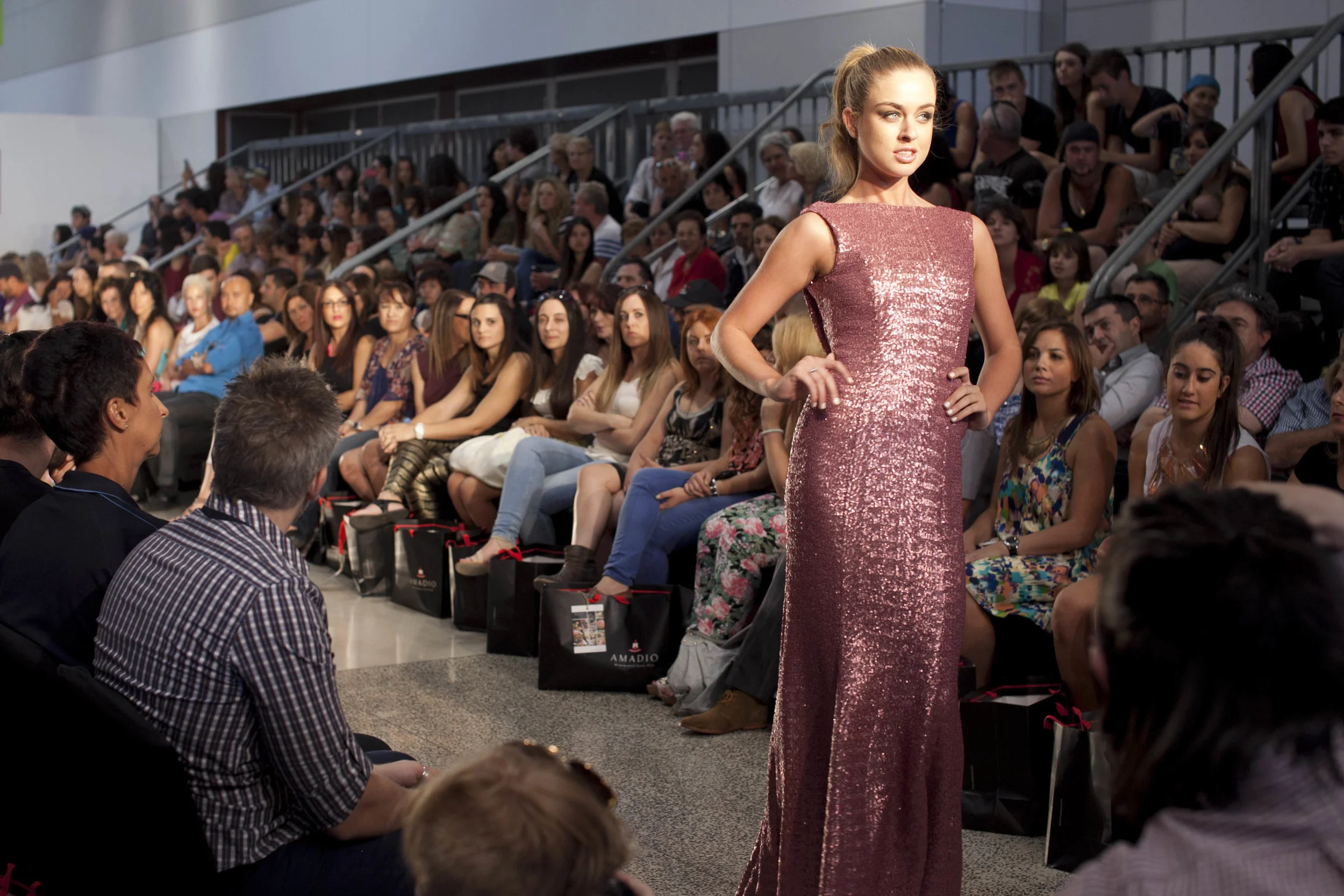 Finesse model Madz Ando wears a couture+love+madness dress in Cristina Tridente's signature glitzy style.