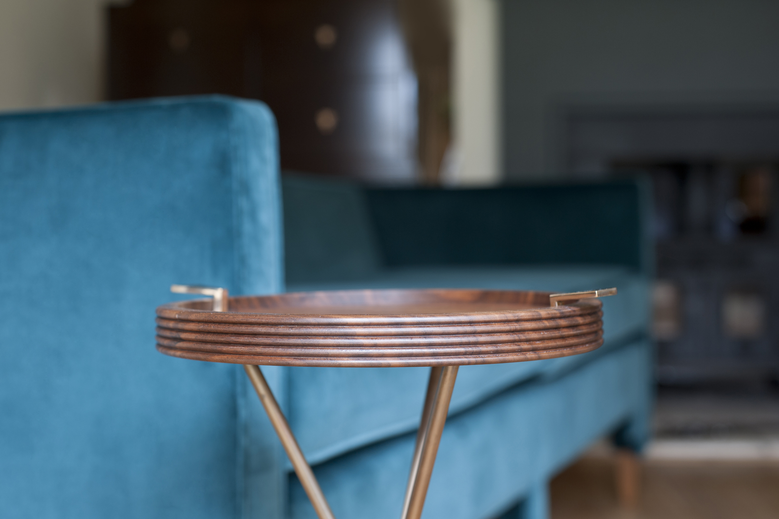 Walnut and bronze drinks table.