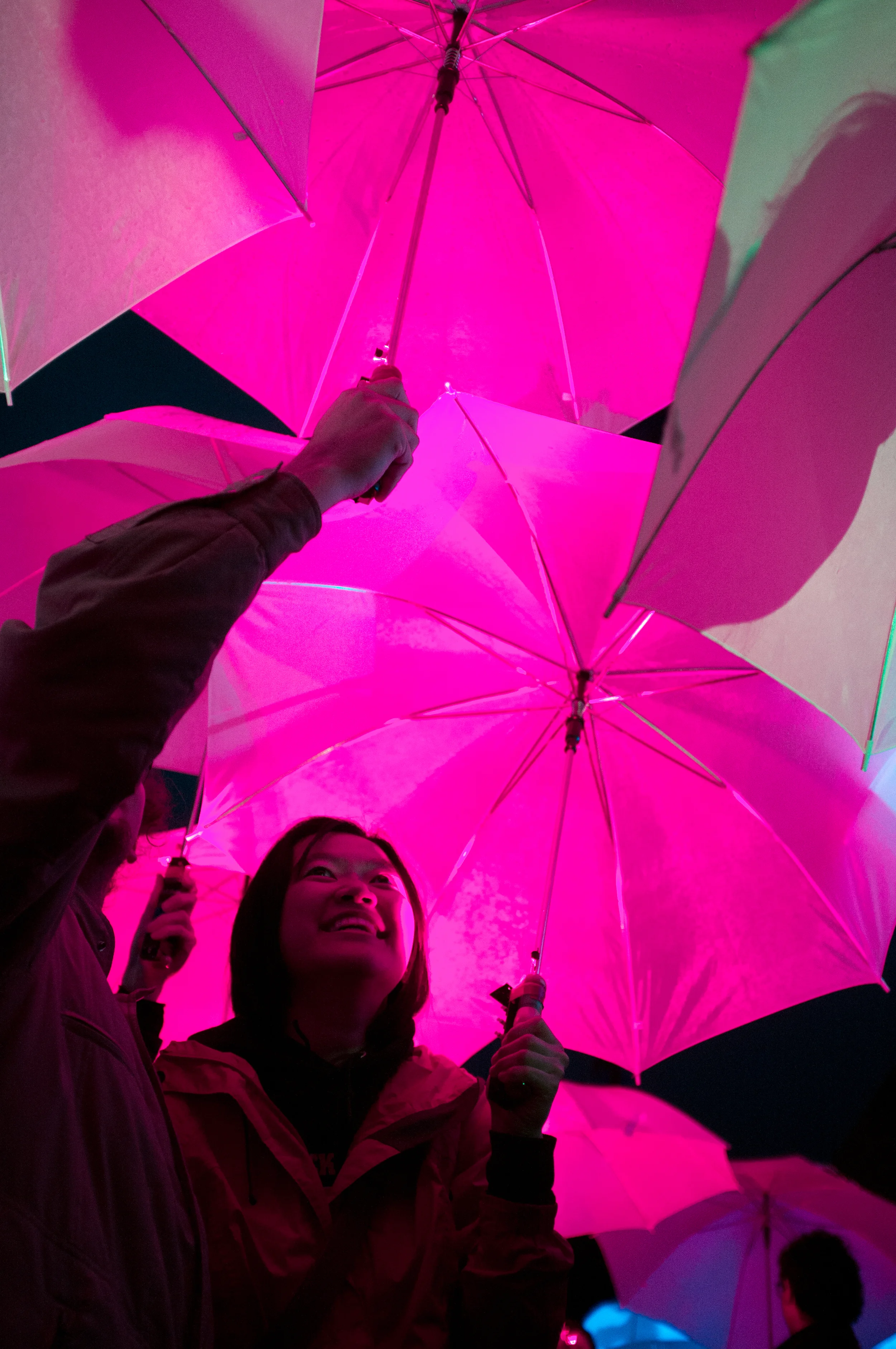  Participants get close with other umbrellas of the same color. Jack Barry Field. Cambridge, MA. 2013 