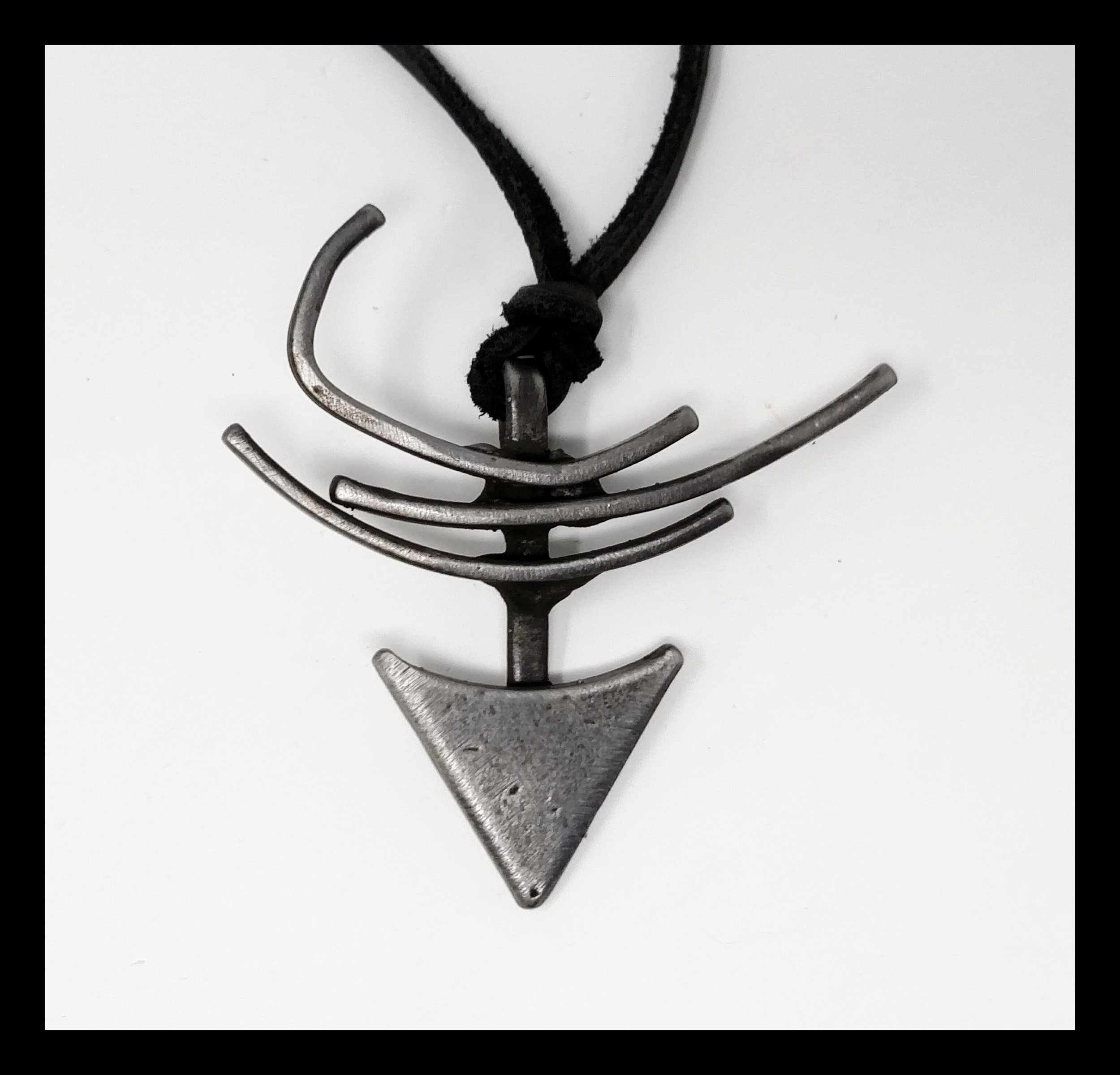 Something symbolic steel pendant.jpg