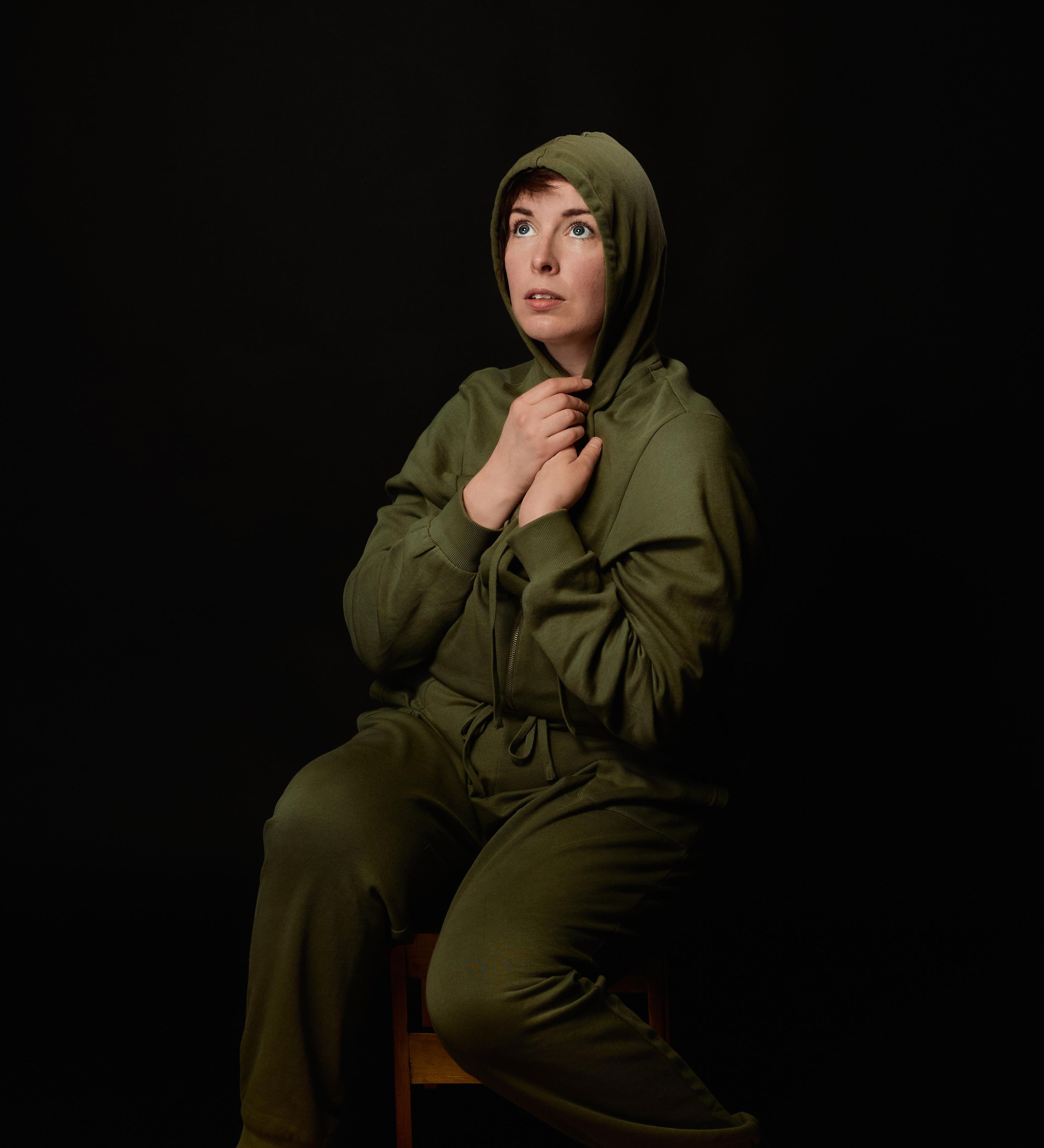 Anne Zander is MOTHER_Le Why Not Productions_Anne Zander Seated Angelic Hoodie_photo by Jess Bohonik.jpg