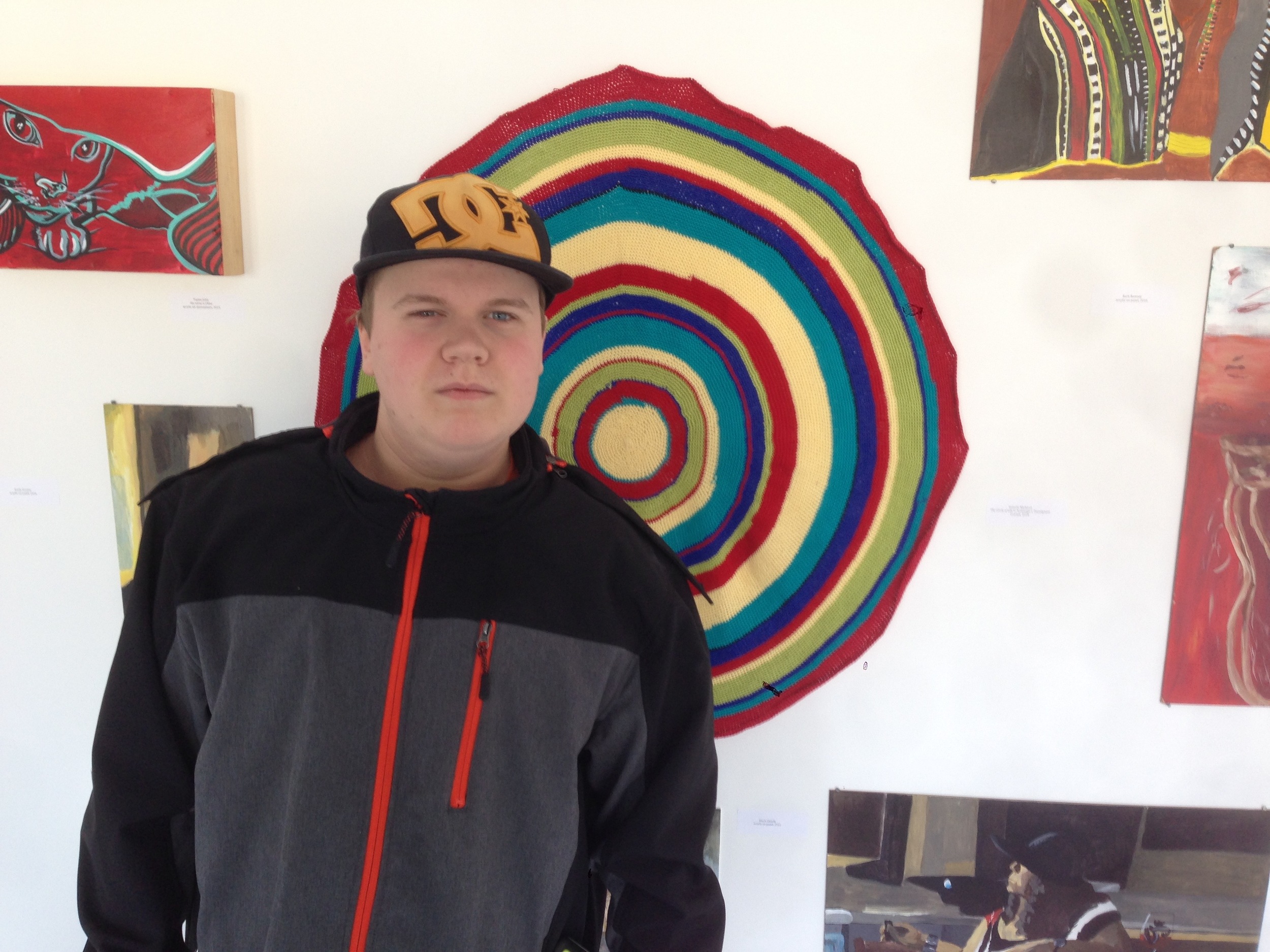 Jon in front of one of Isabelle's pieces