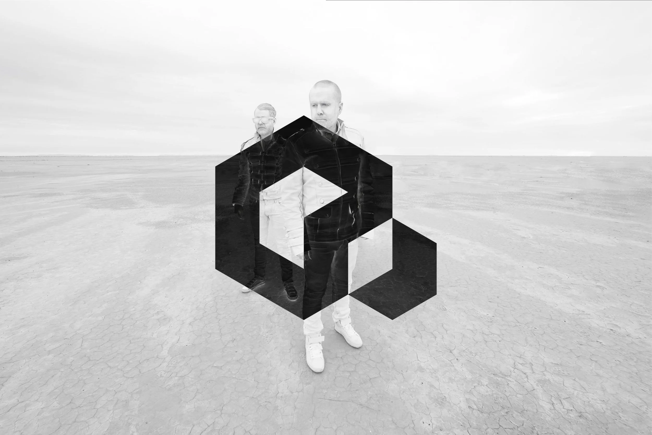 Reform Collective geometric logo symbol overlaid on a black-and-white outdoor photograph.