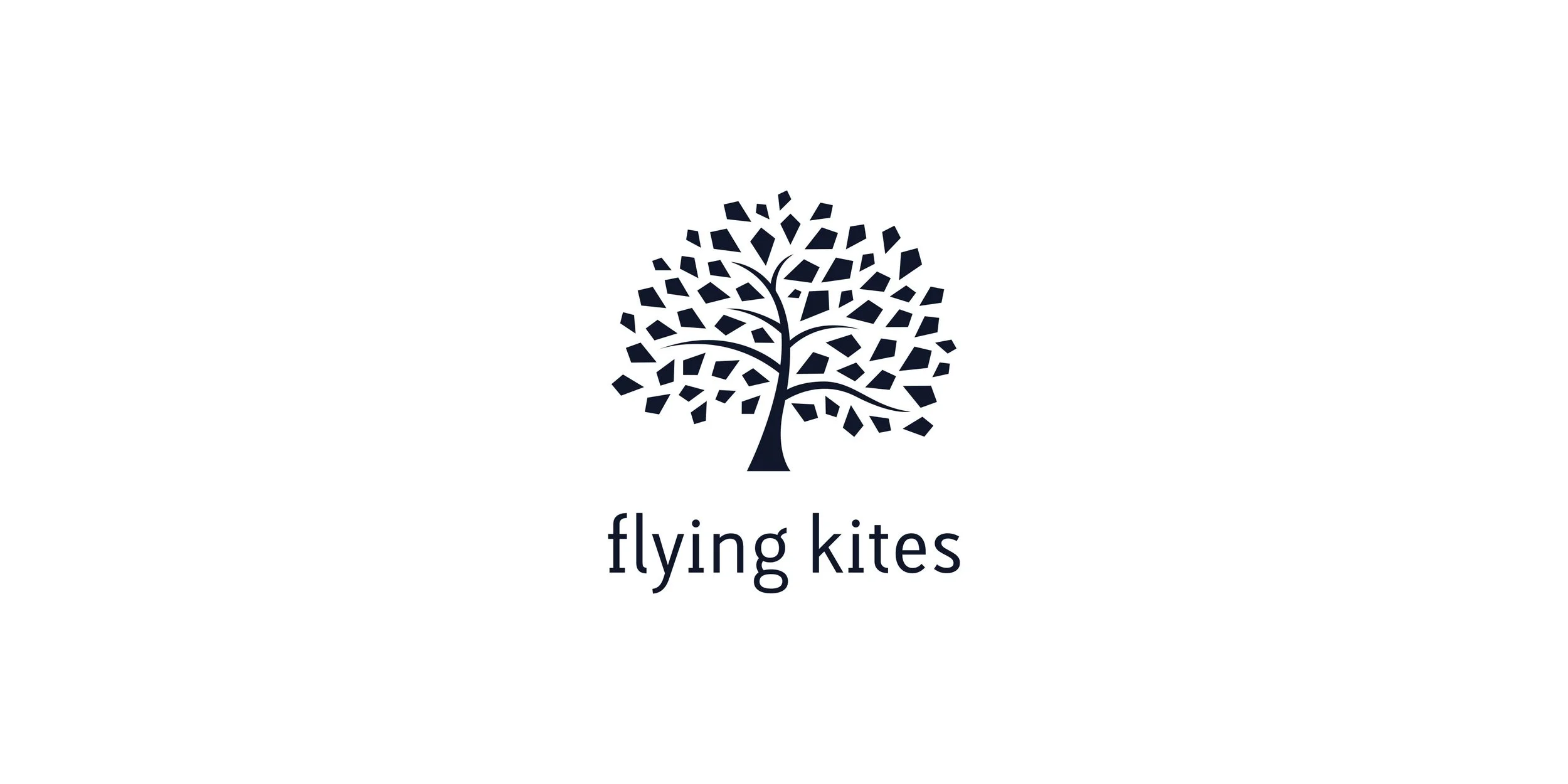 Flying Kites nonprofit organization logo featuring a dark navy tree with kite-shaped leaves and a lowercase wordmark on a white background.