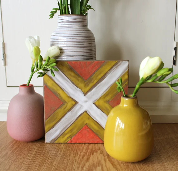I recently glazed a tile at Heath Ceramics. I own a few of their pieces with similar glaze color.