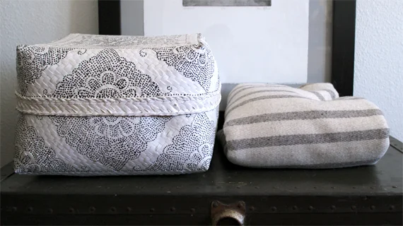 This box is perfect for smooshing a down throw for storage. There is no nice way to fold those. My striped blanket is actually a pancho I got in mexico.