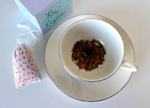 Each tin of tea comes with a confetti printed bag. Filled it's a perfect cat toy.