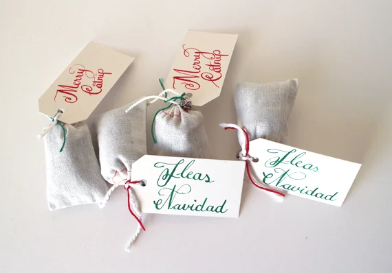 I created some catnip toys labeled Merry Catnip and Fleas Navidad. 