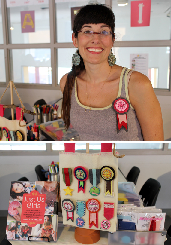 Cindy Ann Ganadan and samples of her medallions.