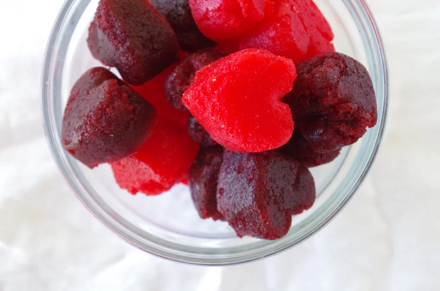 This was my first batch! I used 3 packets unflavored gelatin and one packet flavored for each batch. The red batch has strawberry sugar free gelatin and 4 scoops Gaspari Nutrition's Amino/BCAA blend in Strawberry Kiwi flavor. The purple batch has cherry sugar free gelatin and 4 scoops of grape flavored Essential Amino Energy from Optimum Nutrition. They were super tasty, but I followed the directions on the other website and did not heat the gelatin mixture before adding the amino blend. The result was a much grainier texture than I later got with melting the gelatin first.