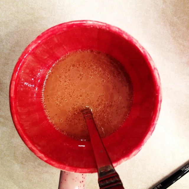 Staring down the barrel of a large cup of Bulletproof coffee. 1 tsp coconut oil + splash of half + half to get me through an otherwise low-cal/ no-carb morning.