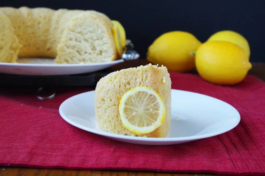 A recipe for Lemon Bundt Cake that is moist, rich, & filled with healthy ingredients! #healthybaking