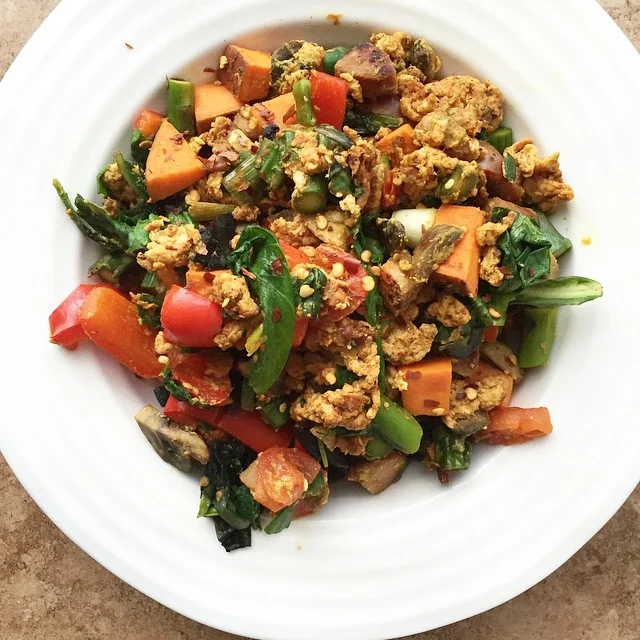 Hot salad with stir fried veggies, chicken sausage, and egg whites! Awesome, healthy meal from FitCakery.com