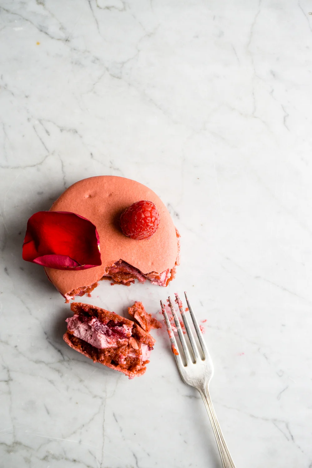 Large Raspberry Rose macaron is sandwiched with raspberry rose gelee and raspberry rose mousse.