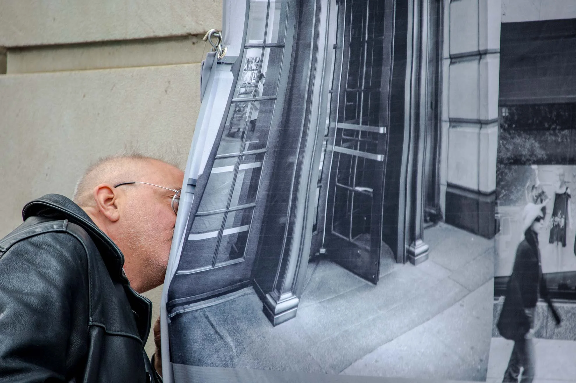 man peering into BG window.jpg