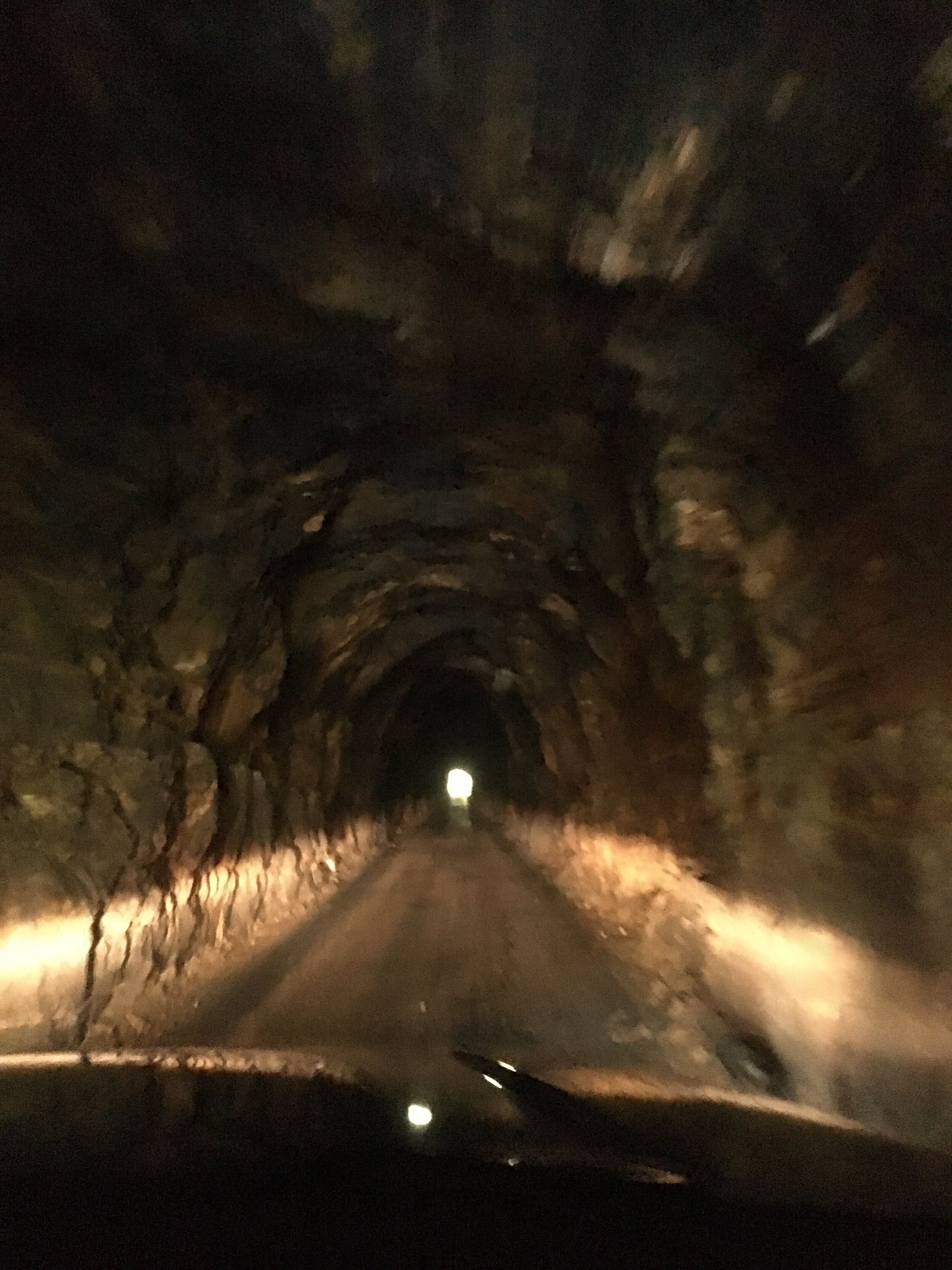 Driving through a one-car, hand carved tunnel