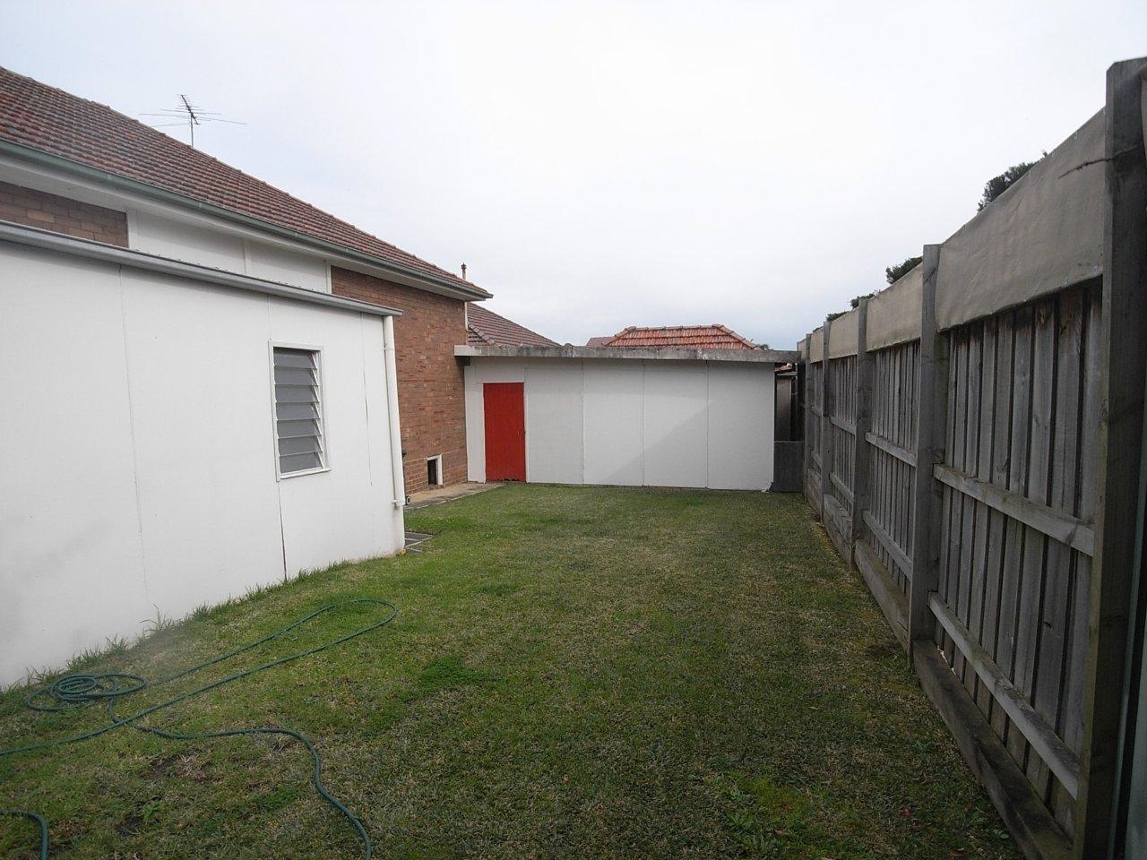 Backyard at 5 Dock before the renovation