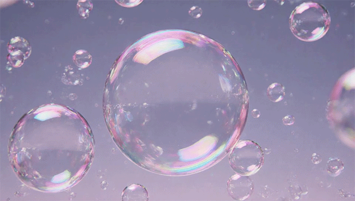 Firefly-clear-pink-holographic-bubbles-floating-on-a-tonal-periwinkle-background-with-the-biggest-bu.gif
