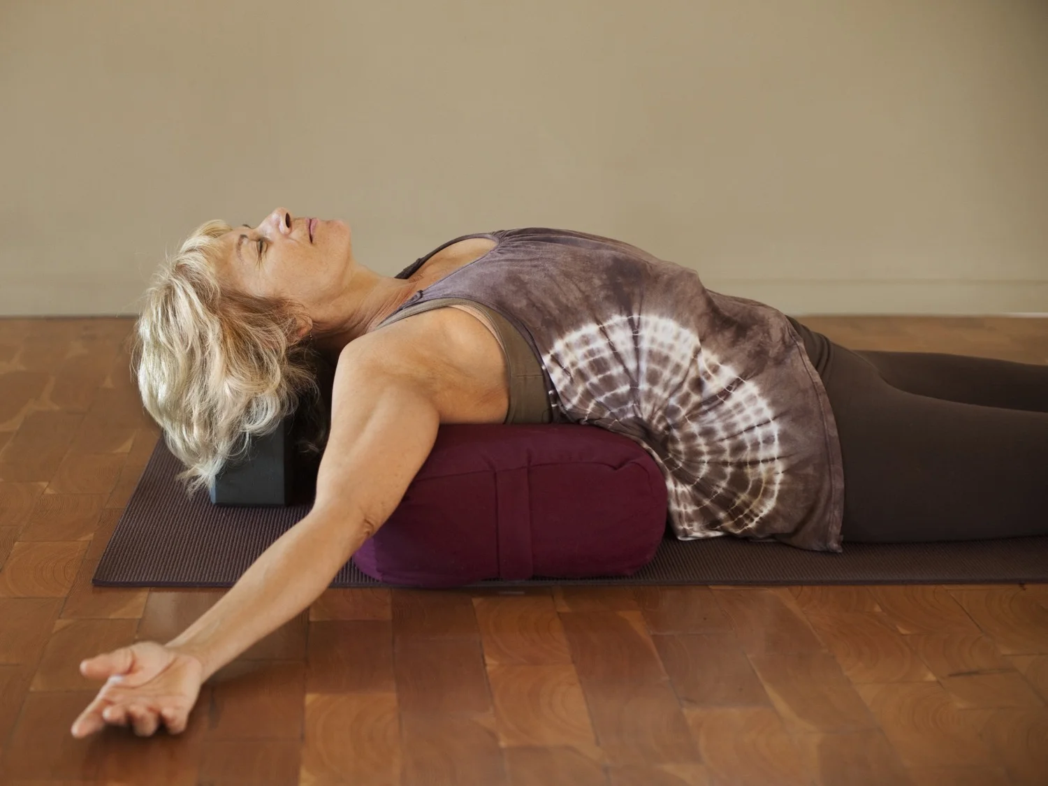 Woman On Yoga Bolster.jpg