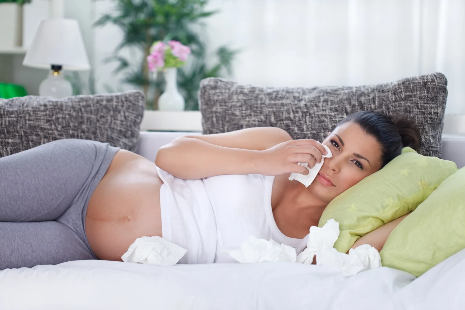 Upset pregnant woman crying.jpg