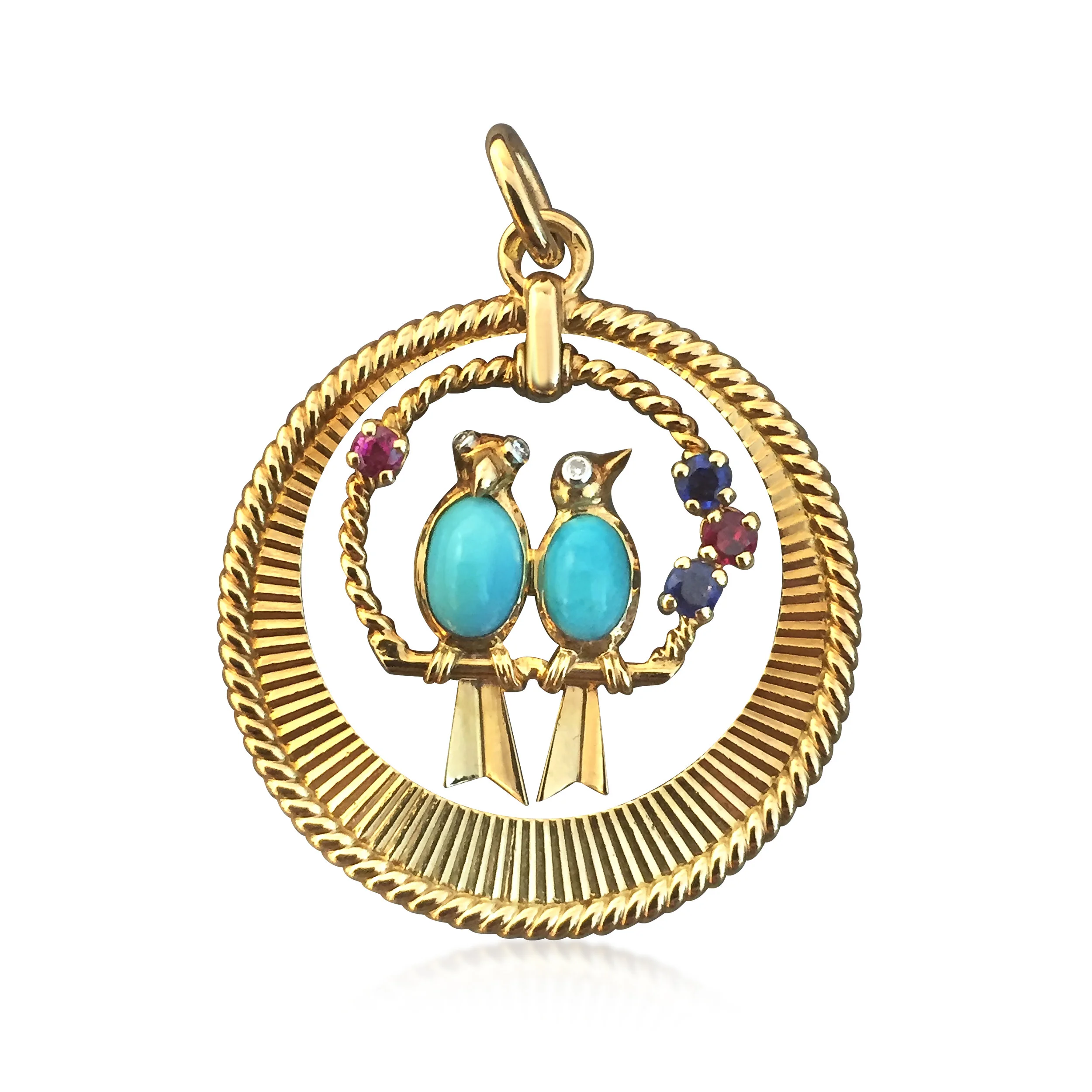TN-NOBM17_RVJ CO-272_A Turquoise, Ruby Sapphire and Diamond pendant by Van Cleef and Arpels .jpg
