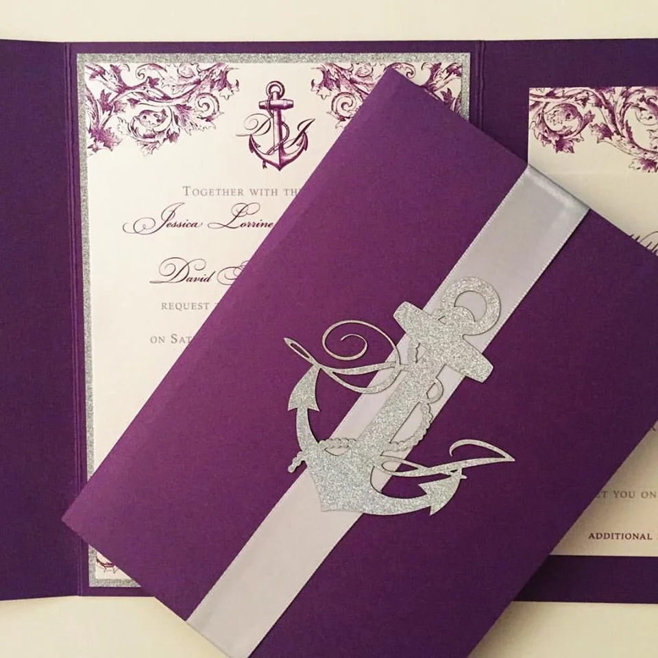 Customized in a color palette of platinum and violet. Upgraded with a trifold enclosure, invitation backing layer, ribbon band and special order laser cut monogram sticker.