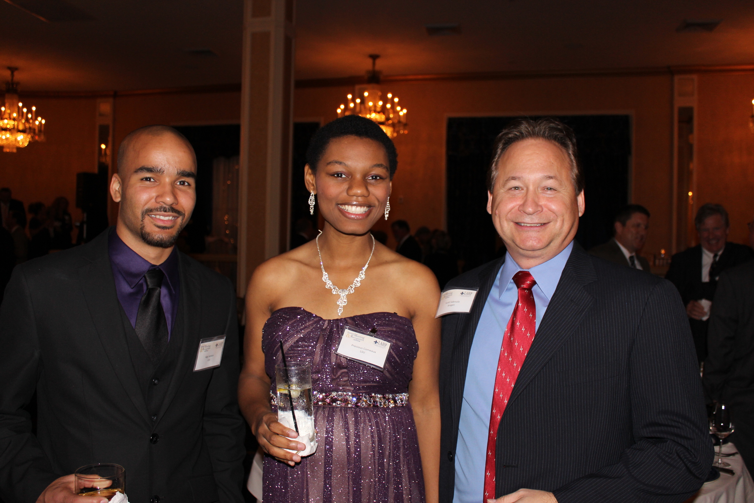  Algy Semien of LSU (left), Precious Comeaux of LSU (center) and Scott Sabrsula of Amgen (right) 