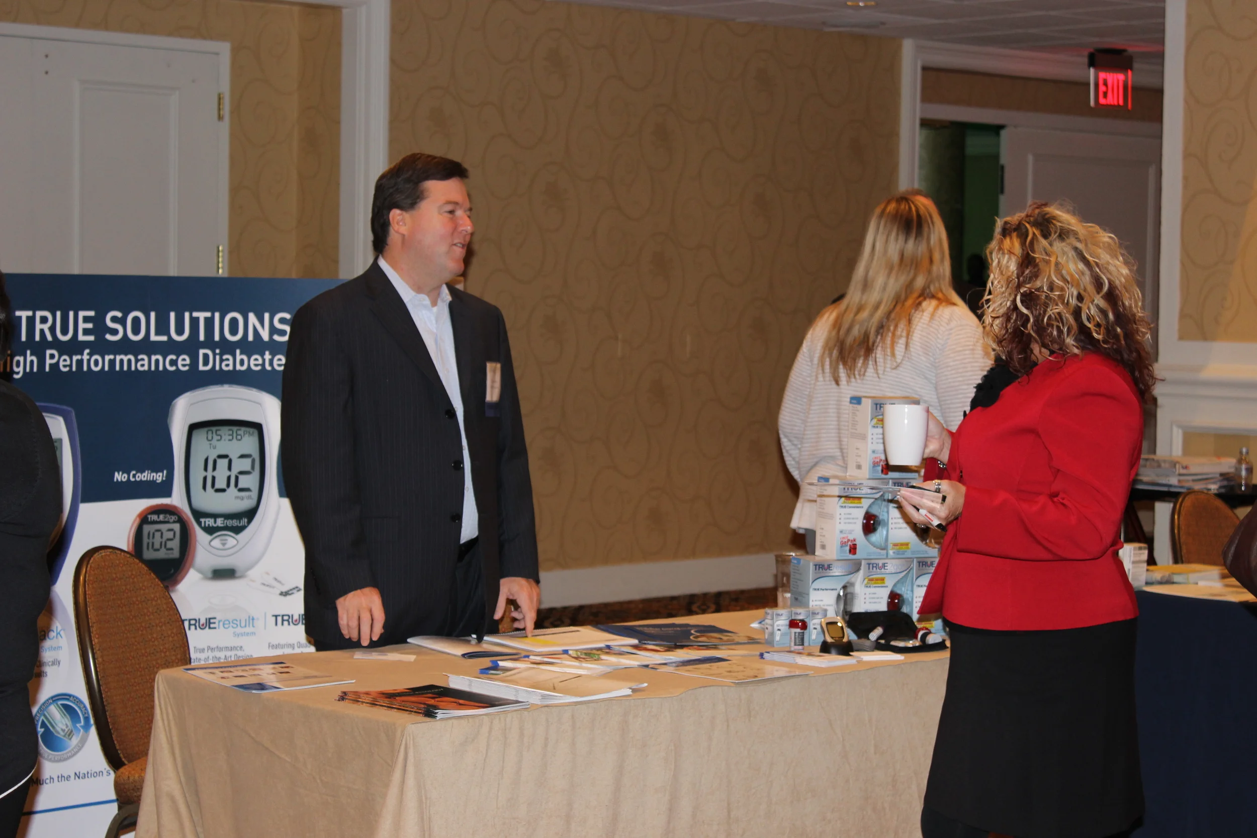  Conference attendees network with colleagues and view exhibitors at the 2013 LAHP Annual Conference 