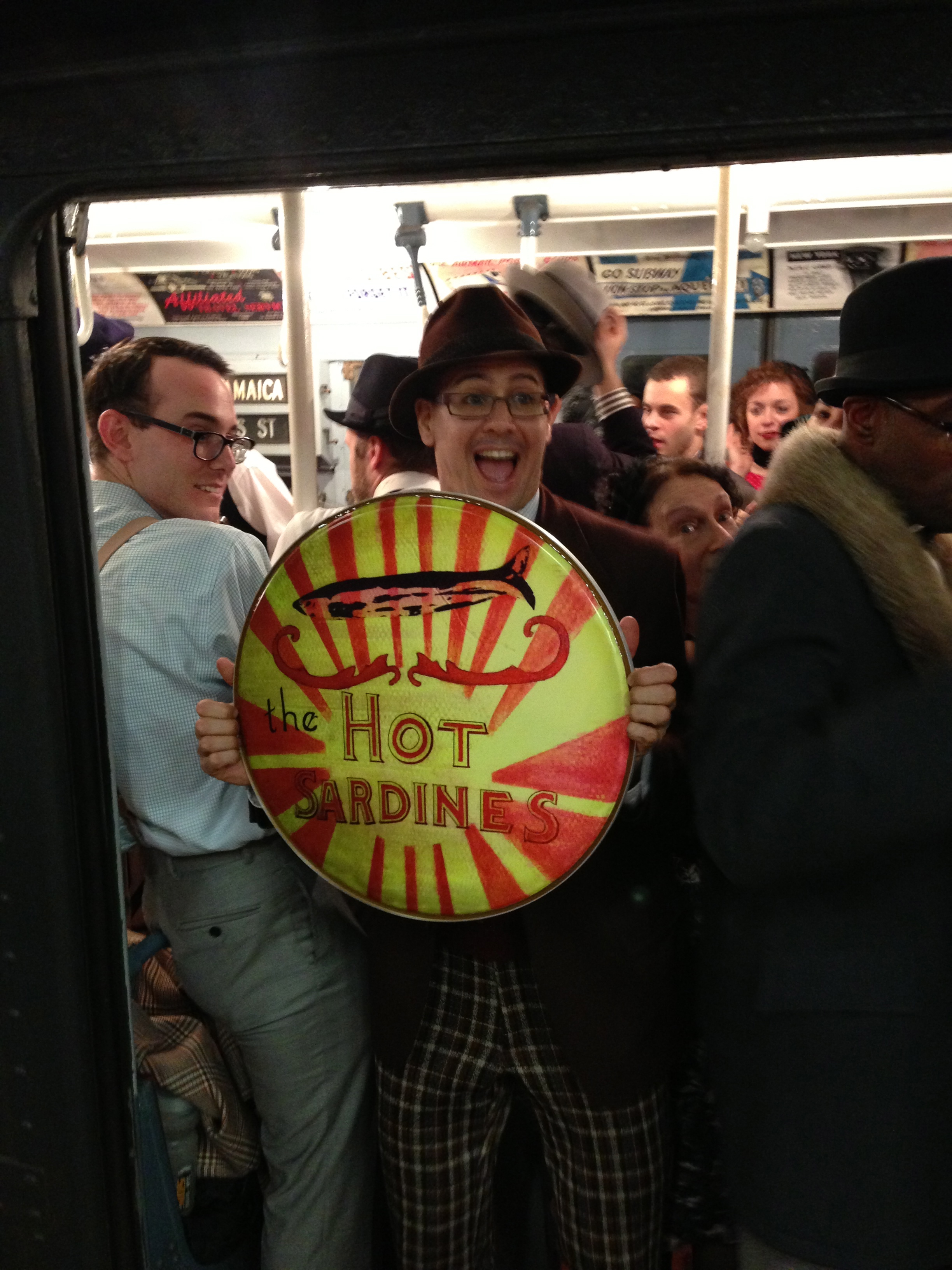 Hot Sardines riding the holiday train