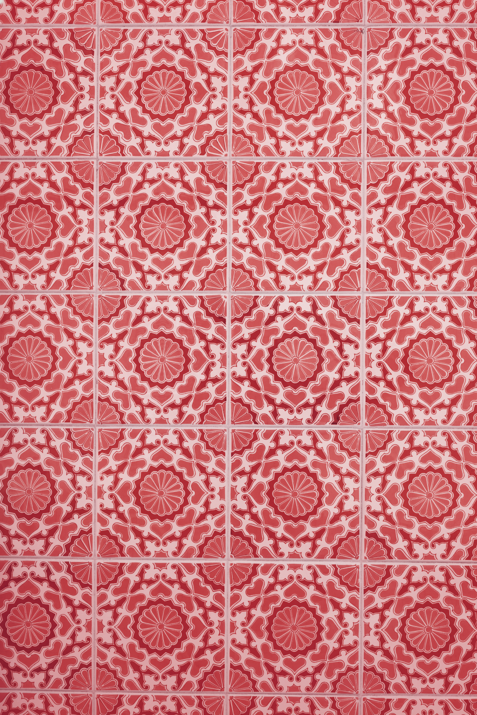 Red patterned tile backdrop.png