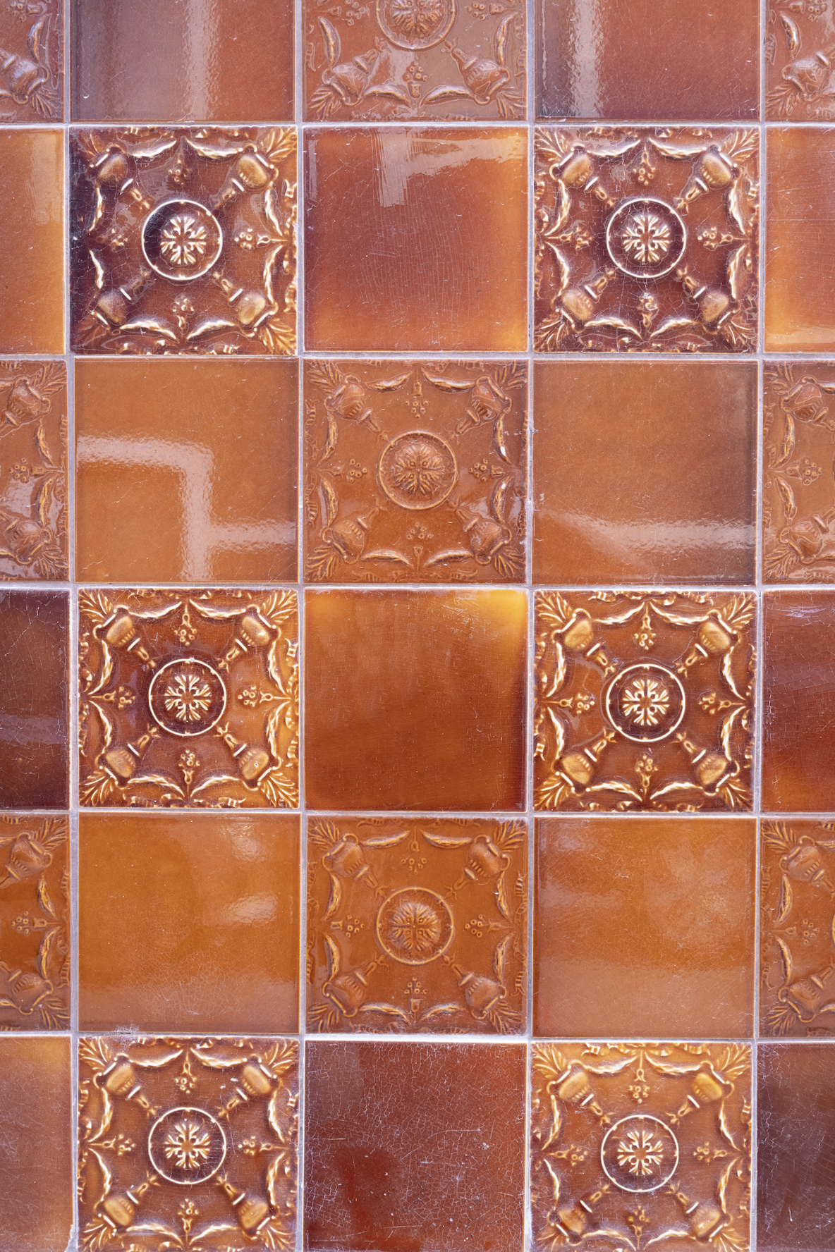 Glazed terracotta tile backdrop.png