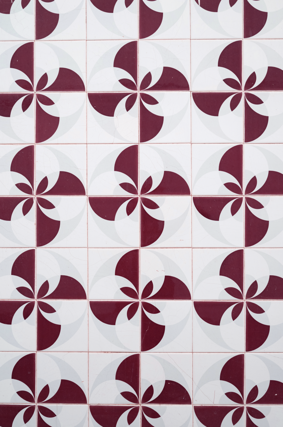 Red print tile backdrop.png