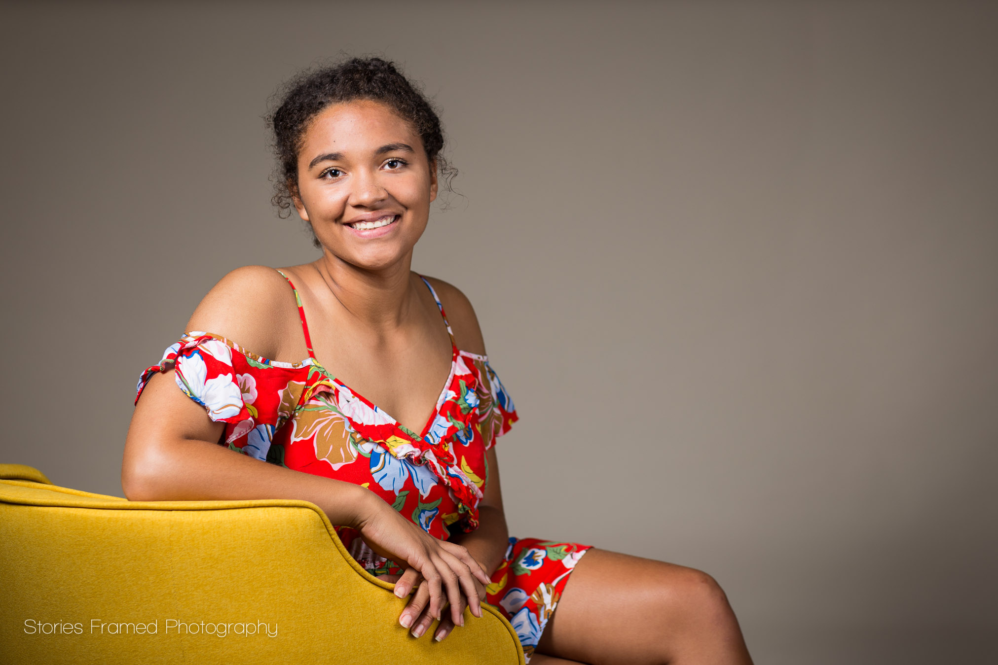 tosa-west-senior-in-studio-with-yellow-chair.jpg