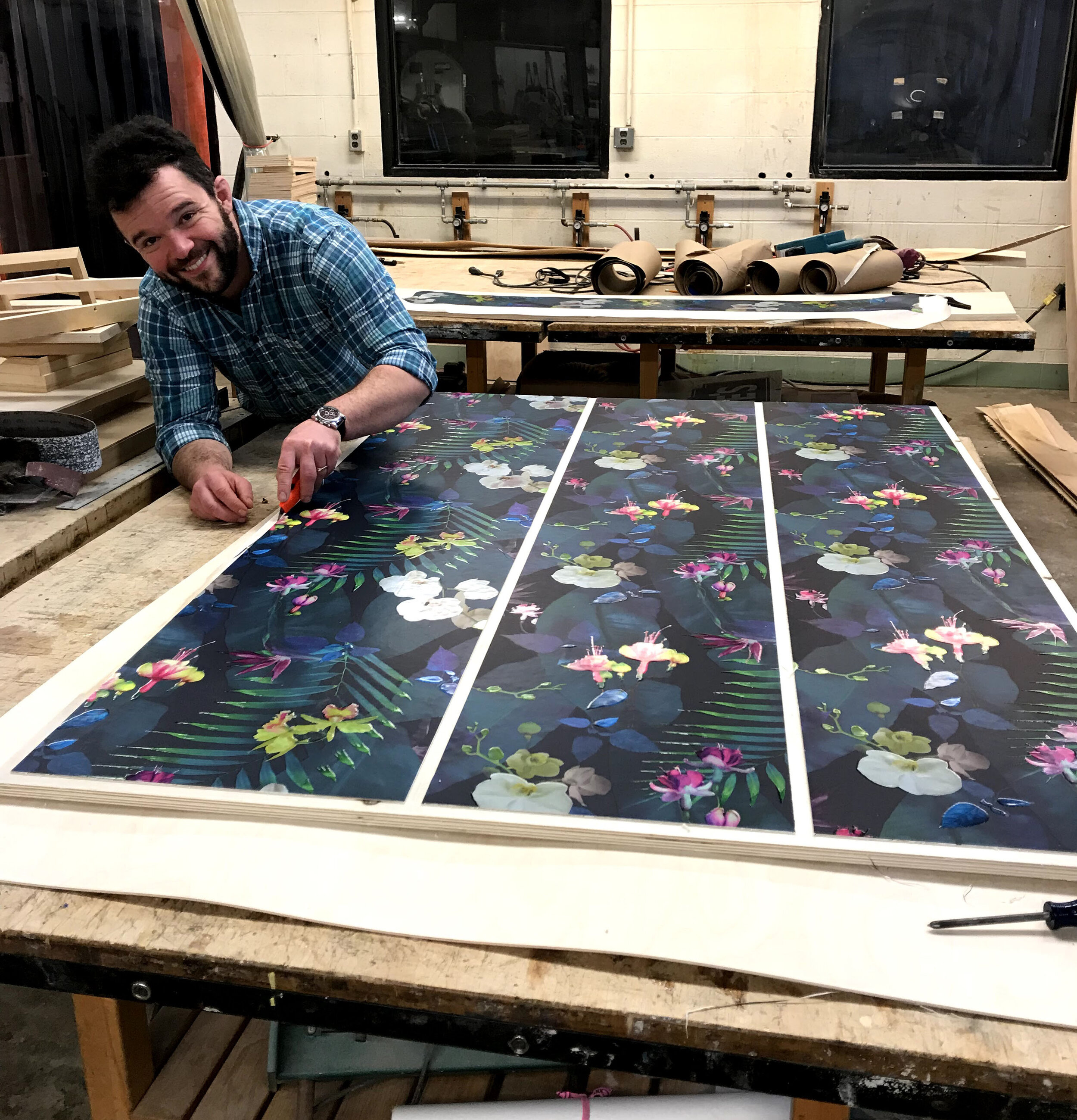 Nate working on a custom bookcase in 2018