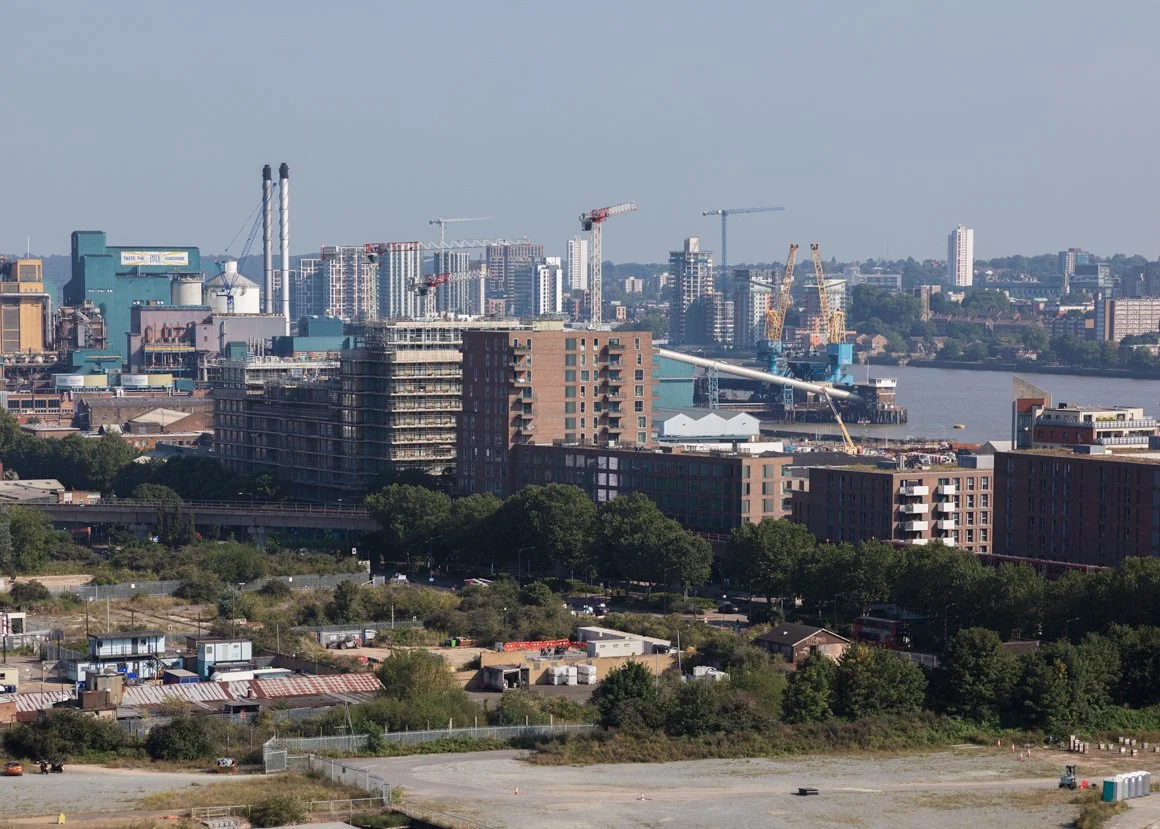 View of new housing developments and Tate & Lyle sugar cane refinery from the roof of Spillers Millenium Mills